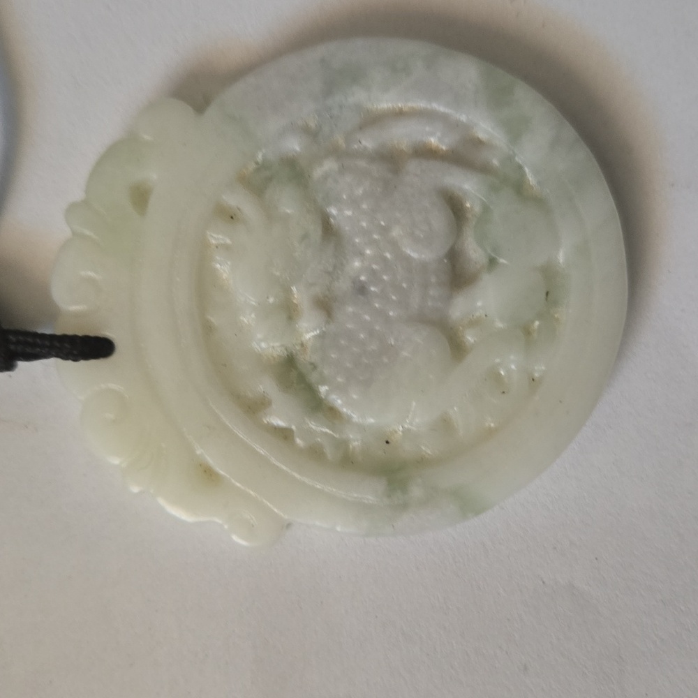 White jade kirin pendant